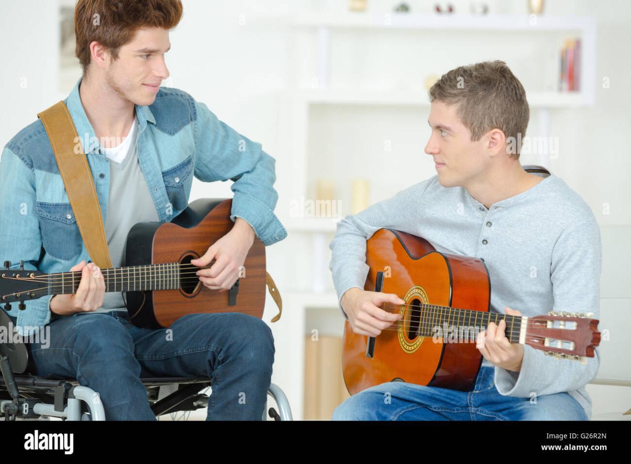 Playing the Guitar Together Stock Photo - Image of chord, strum: 121236356